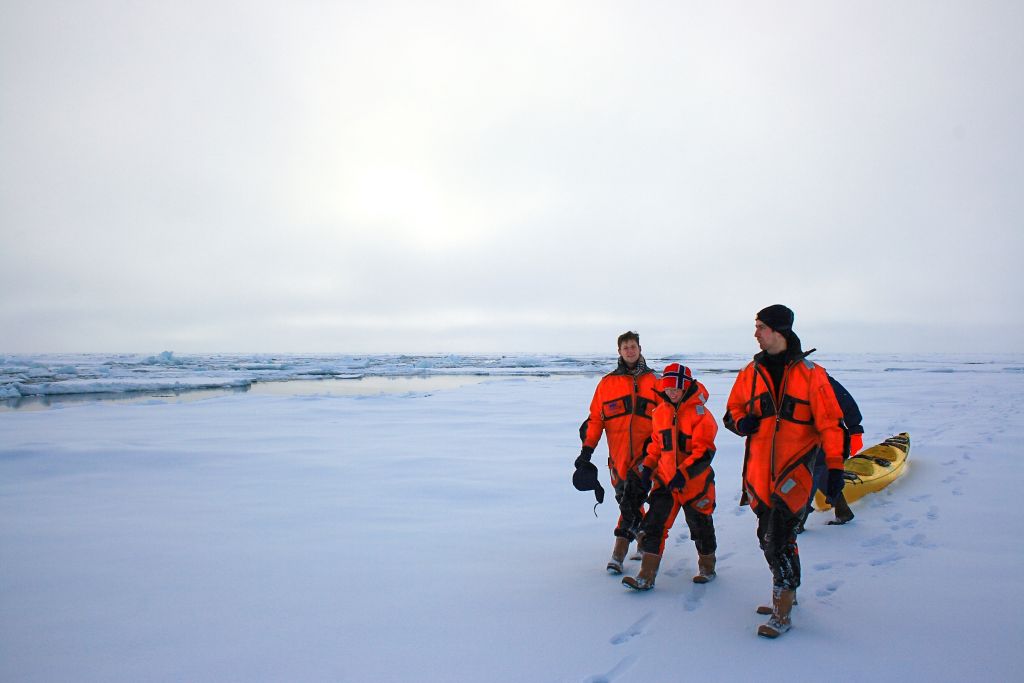 Scientists taking ice thickness measurements using electromagnetic induction sounding. - © Alfred Wegener Institute / Stefan Hendricks