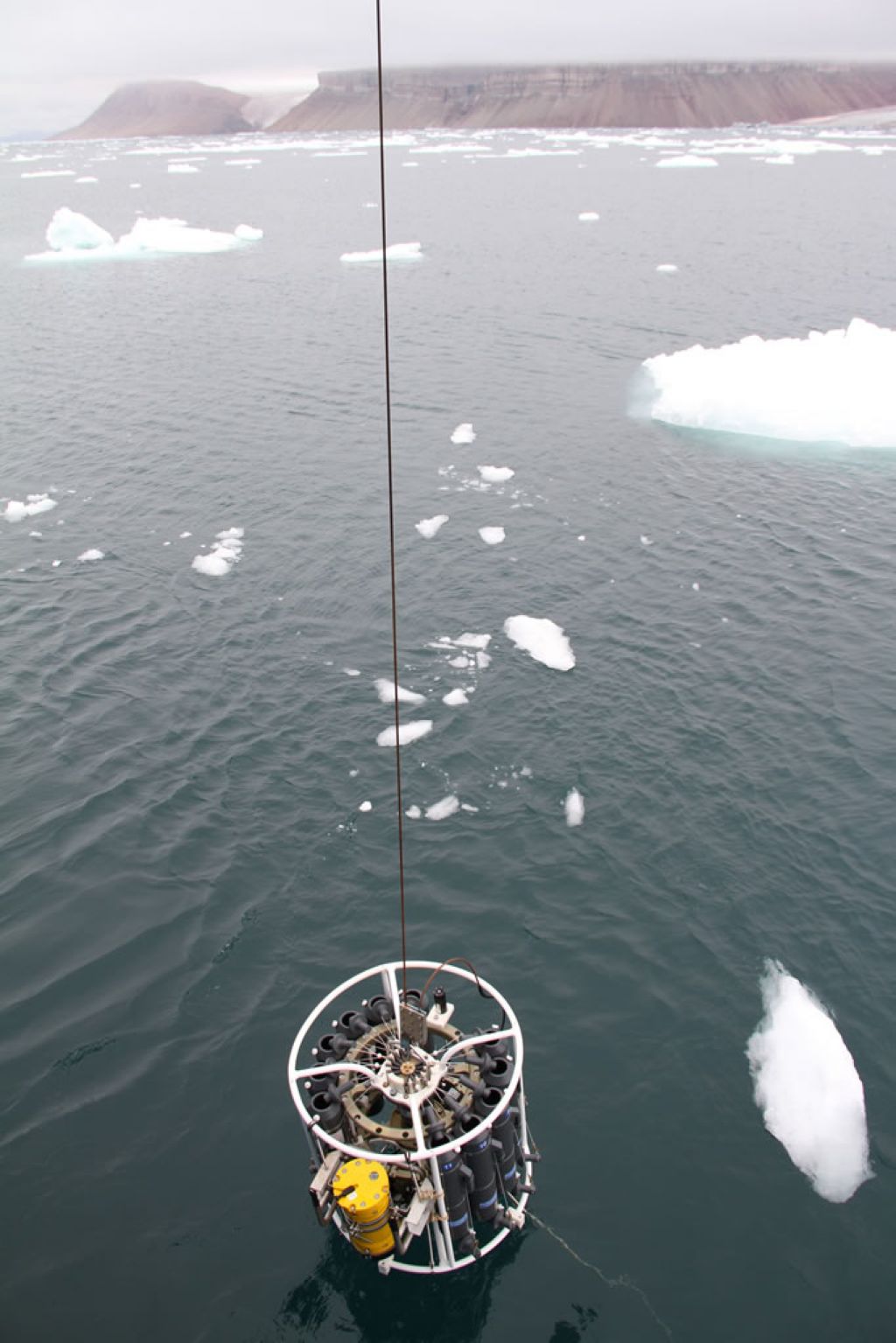 Taking samples from the water - © Agneta Fransson, Norwegian Polar Institute