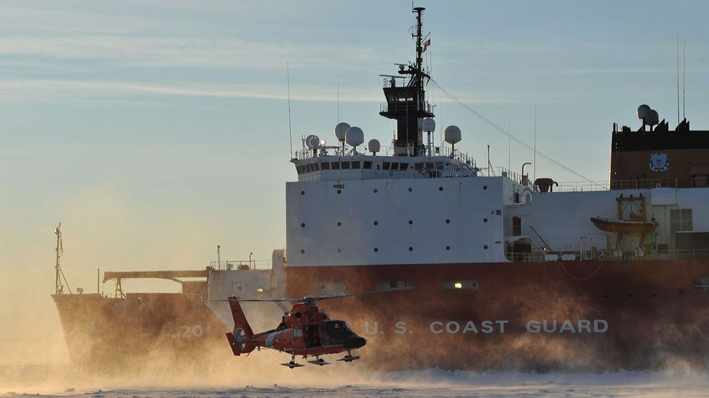 Rescue helicopter landing on the ice in Alaska - © US Coast Guard