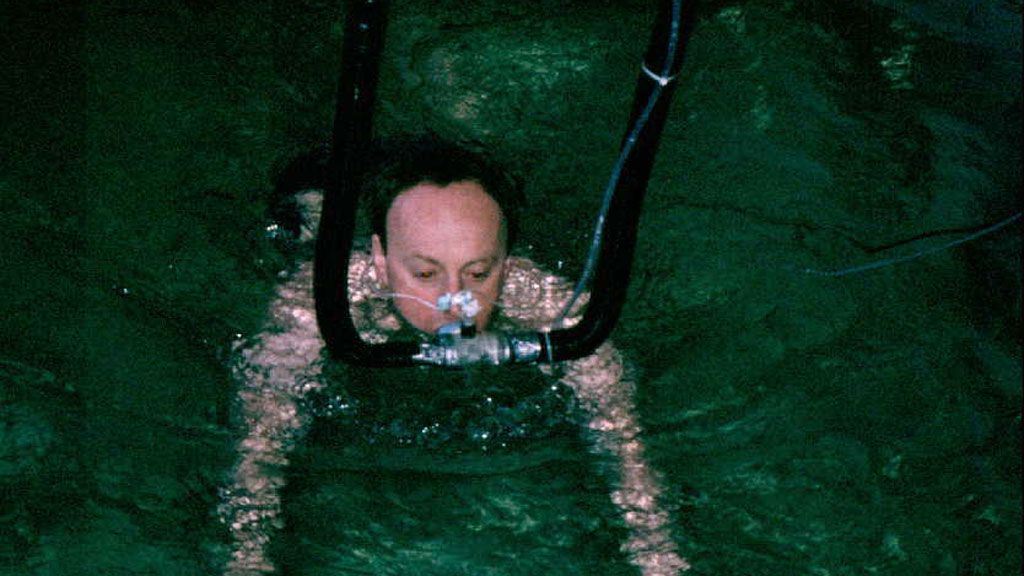 Professor Tipton takes part in one of his own experiments to see how the body reacts as it is exposed to cold water. Here, he takes a 90 minute swim in water at 10°C. - © Michael Tipton