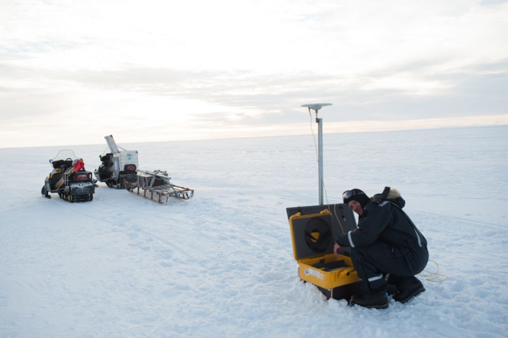 Glaciologist and InBev-Baillet Latour Antarctic Fellowship recipient Reinhard Drews installing a GPS station on the King Baudoin ice shelf as part of the Be:Wise scientific project. - © International Polar Foundation