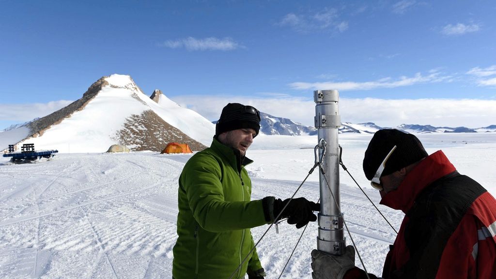 Jan Lenaerts testing the instruments on the automatic weather station on the King Baudouin Ice Shelf