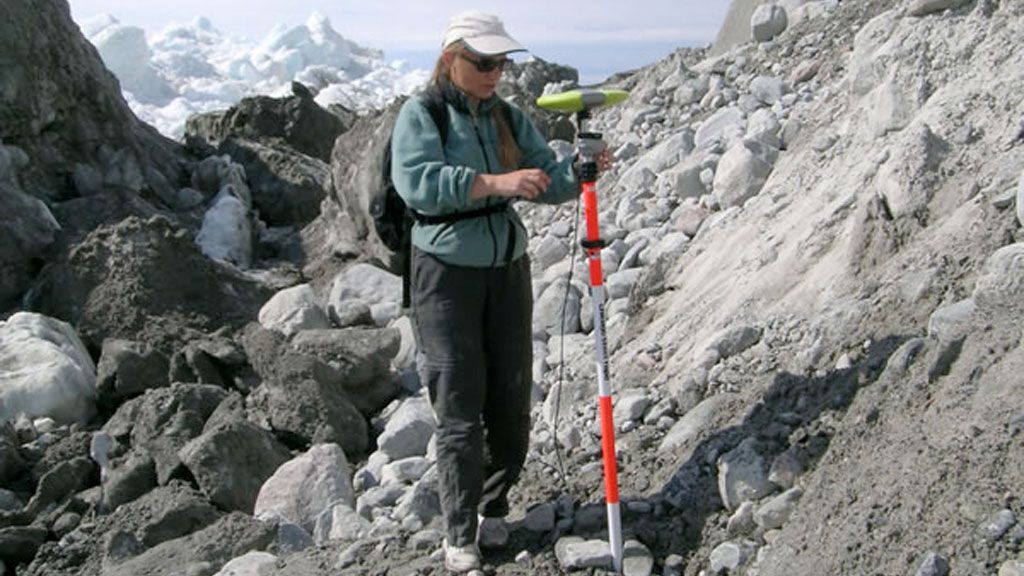 Dr.  Beáta Csathó setting up instruments in Greenland