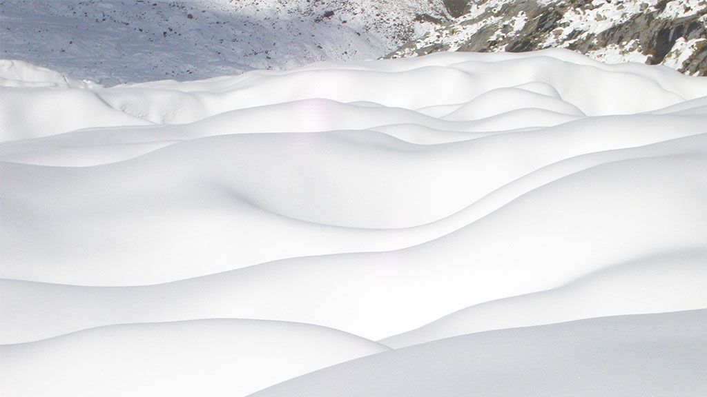 Snow dunes on a glacier surface